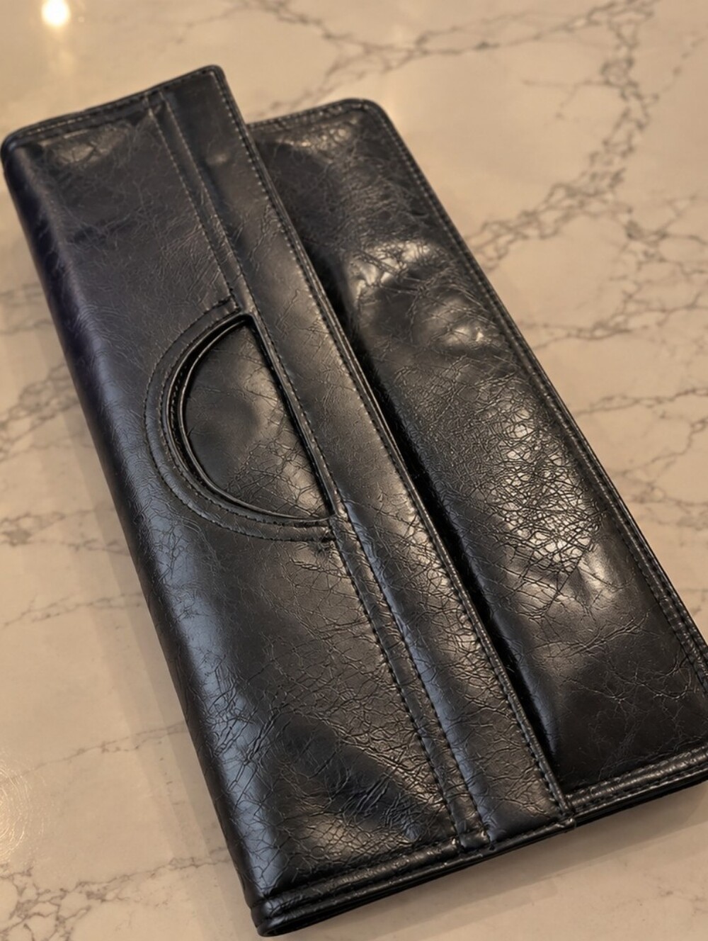 Womens Black Leather Foldover Clutch Bag With Magnetic Closure.